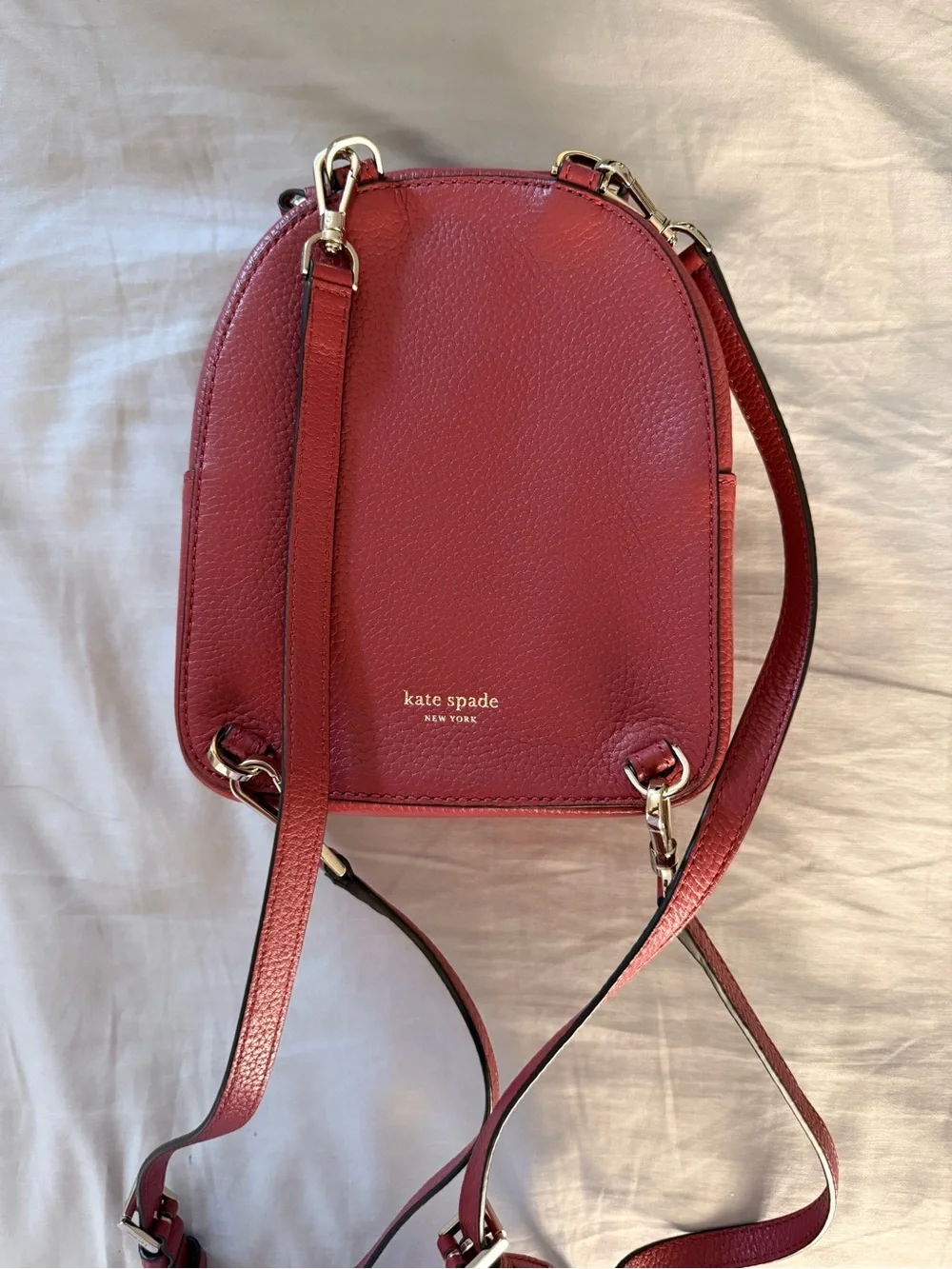 kate spade pebble leather red mini backpack